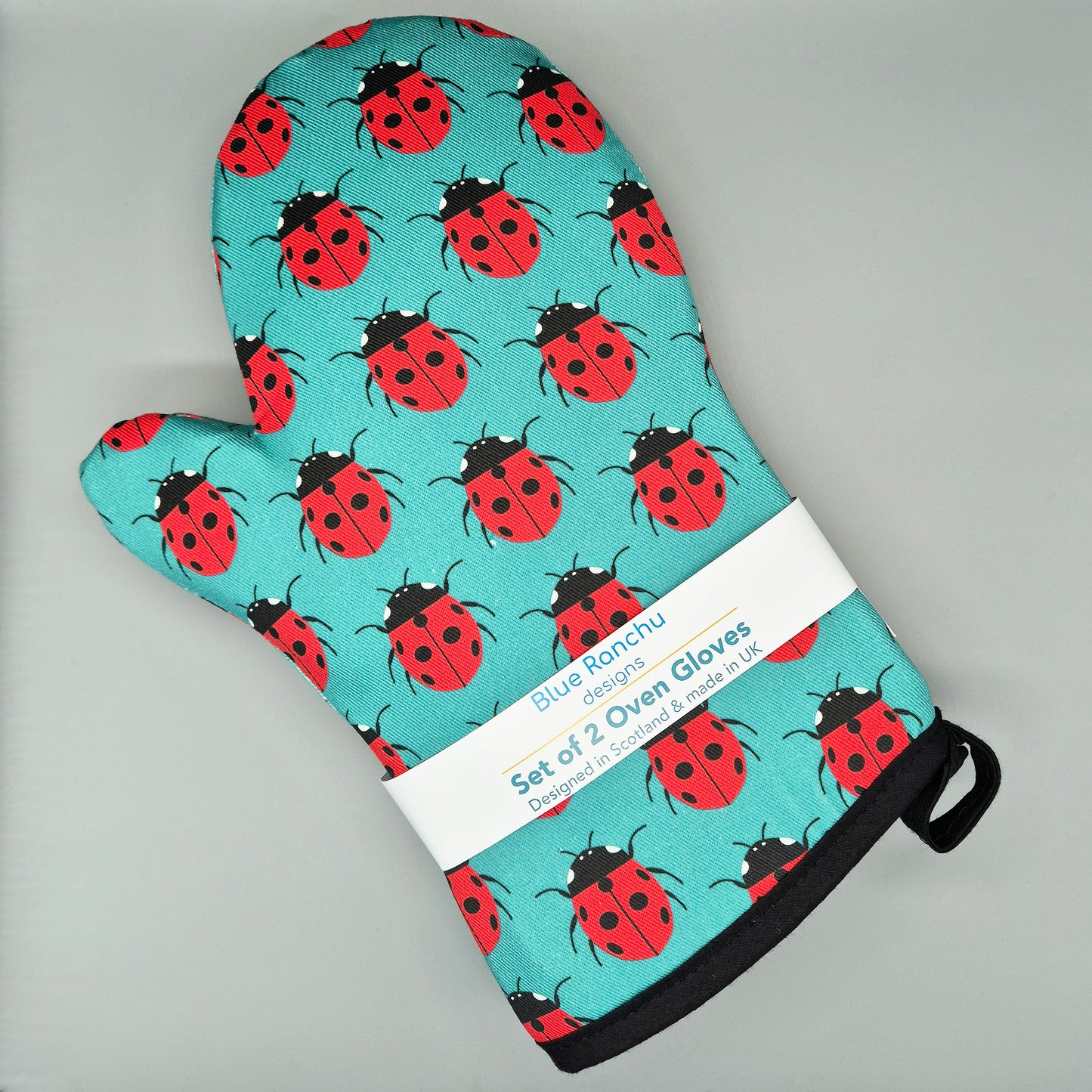 Oven mitts with ladybug pattern