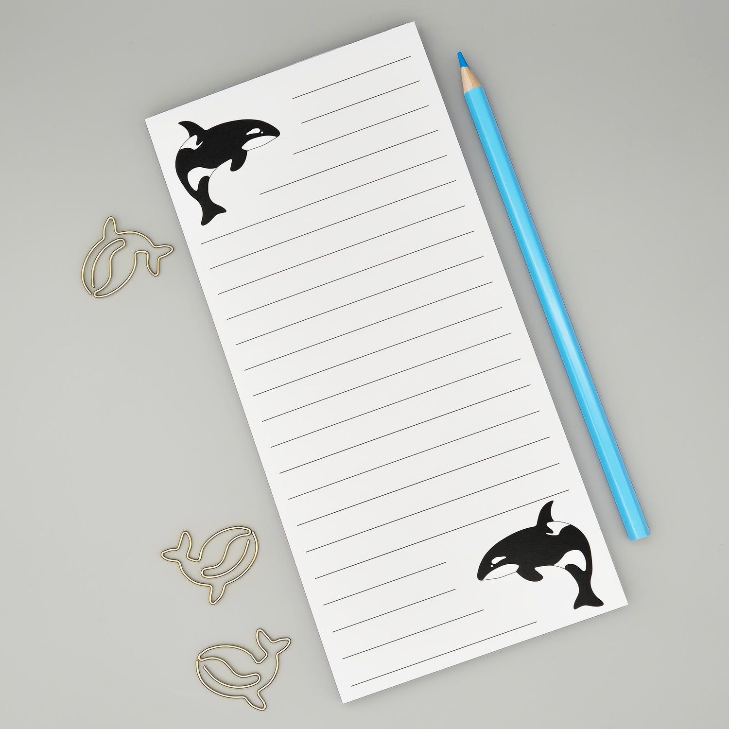 Orca magnetic list pad with two Orcas and lined paper