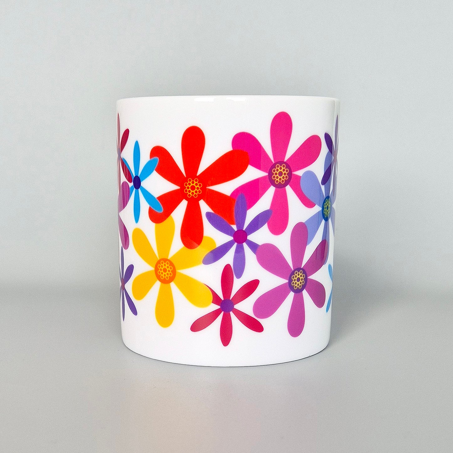 Side view of Summer Flowers bone china mug wth multicoloured flowers