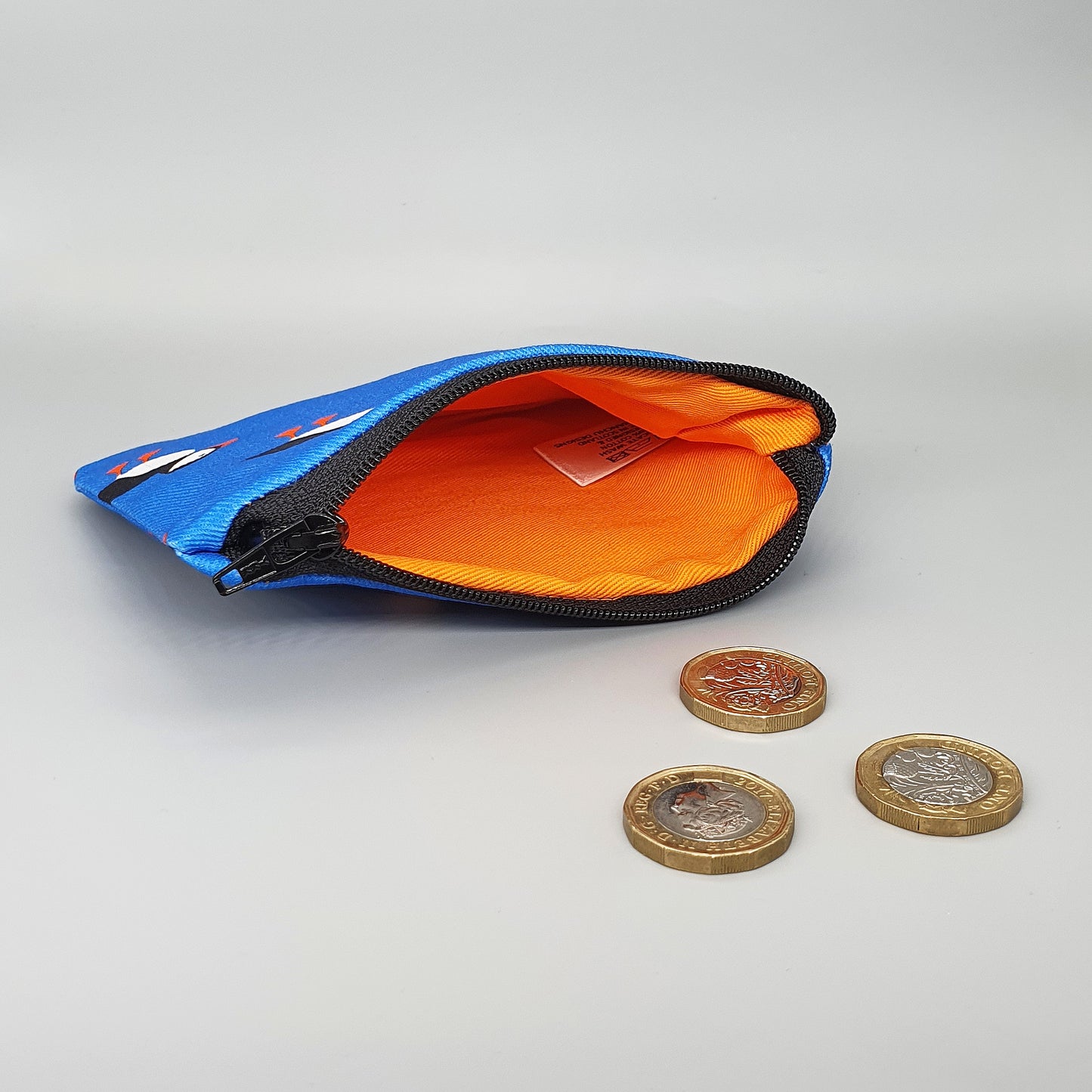 Puffin purse with orange lining