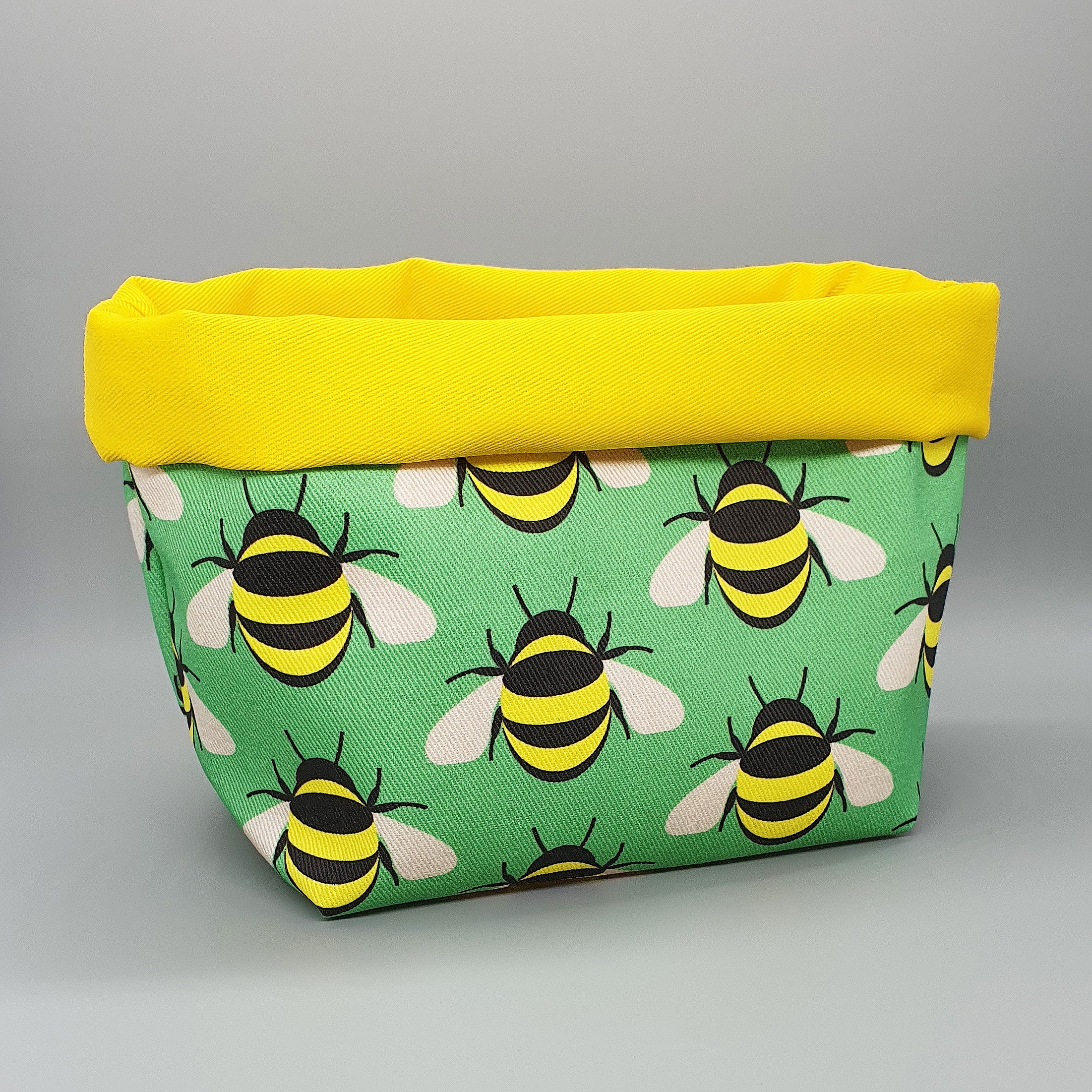 Bee handmade fabric storage basket with yellow lining