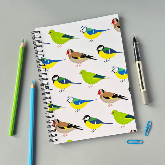 A5 wirebound notebook with colourful garden birds design on a white background