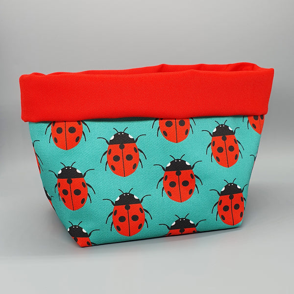 Ladybird handmade fabric storage basket with red lining