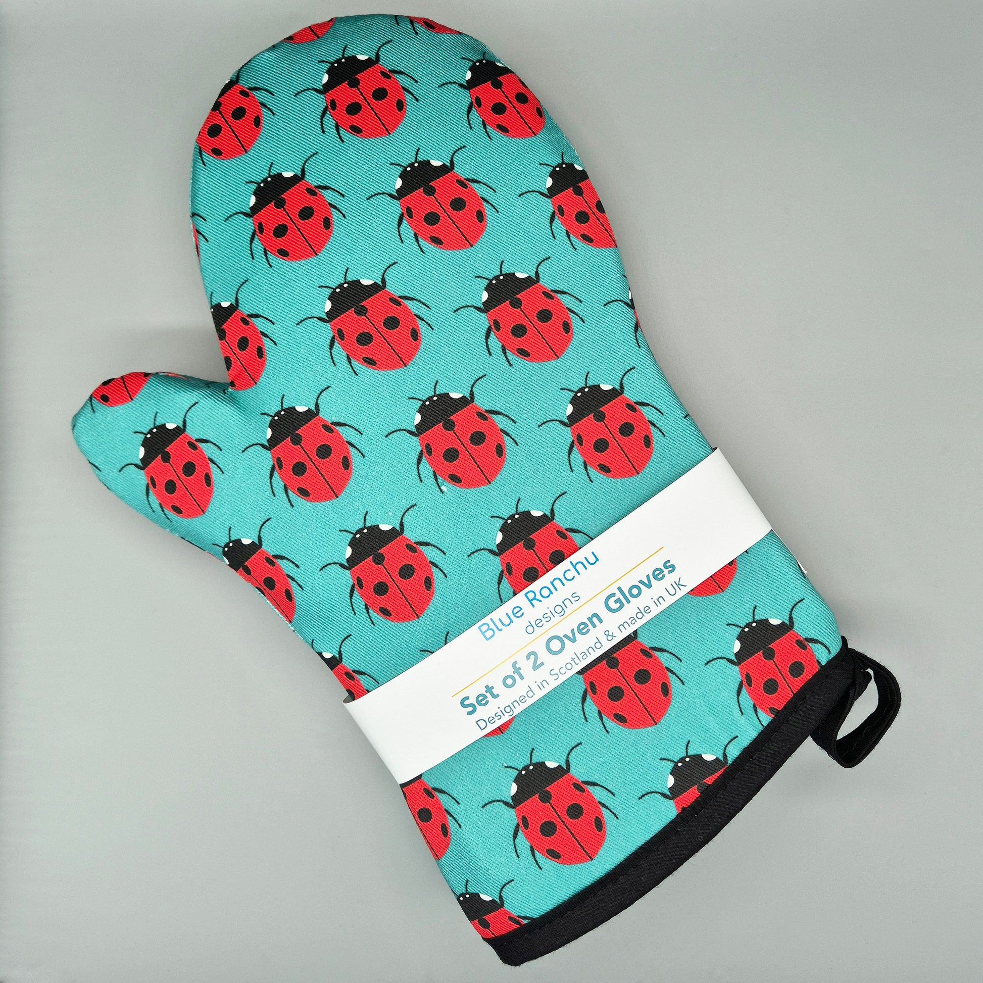 Oven mitts with ladybug pattern 