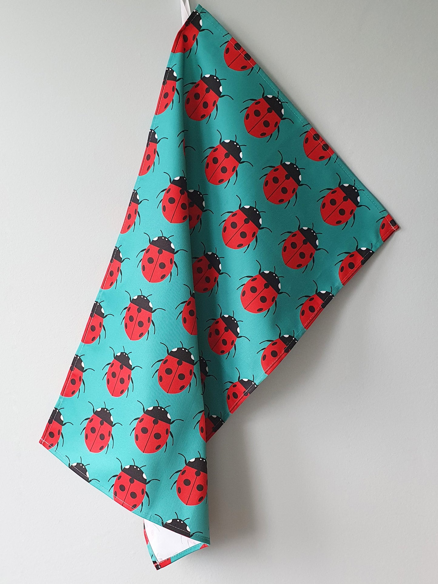 Ladybird pattern tea towel
