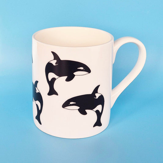 White bone china mug with leaping Orca design