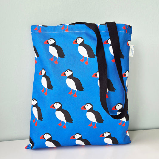 Blue tote bag with puffin pattern 
