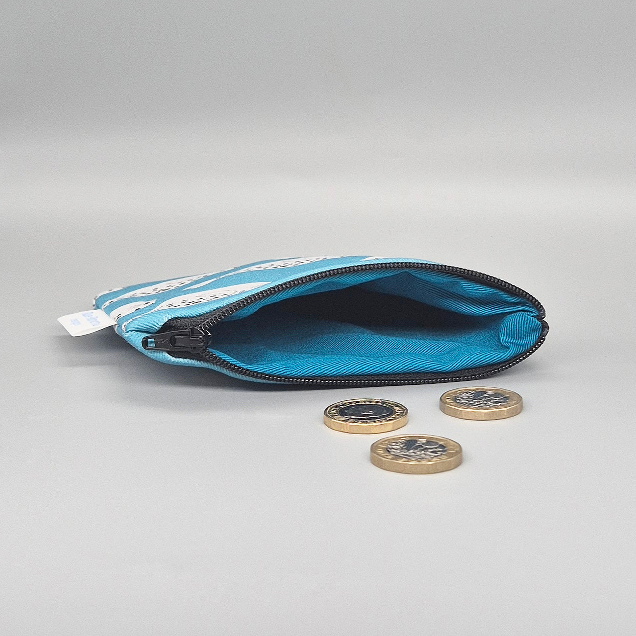 Turquoise lining interior of Seal coin purse