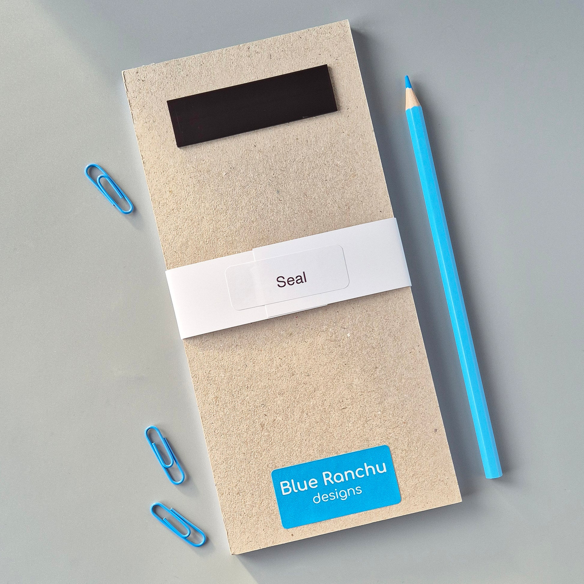 Seal magnetic list pad reverse side showing magnet attachment