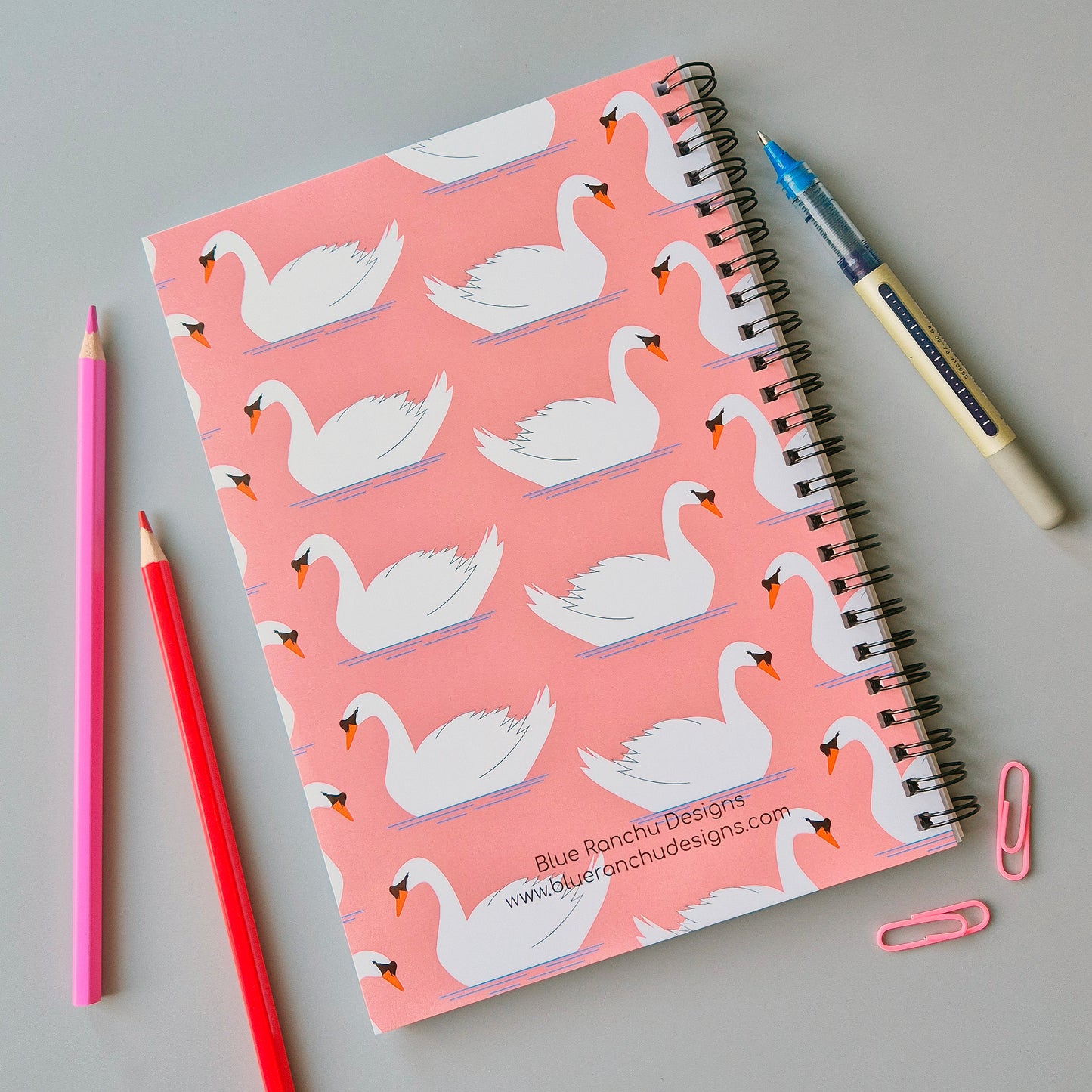 Swimming swans repeat pattern A5 wirebound notebook