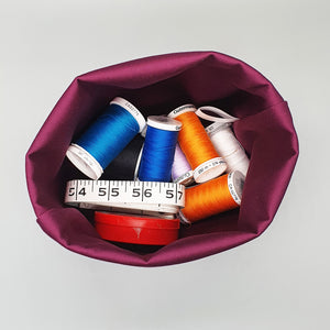 Interior of Labradors storage basket showing sewing supplies being stored