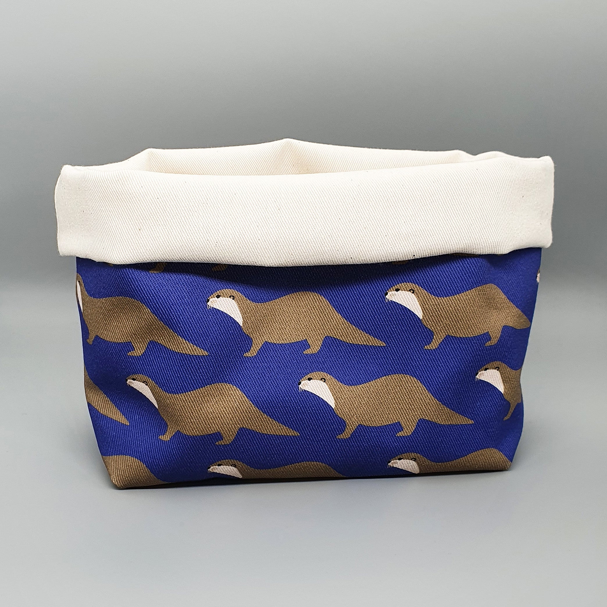 Otter fabric storage basket with natural lining