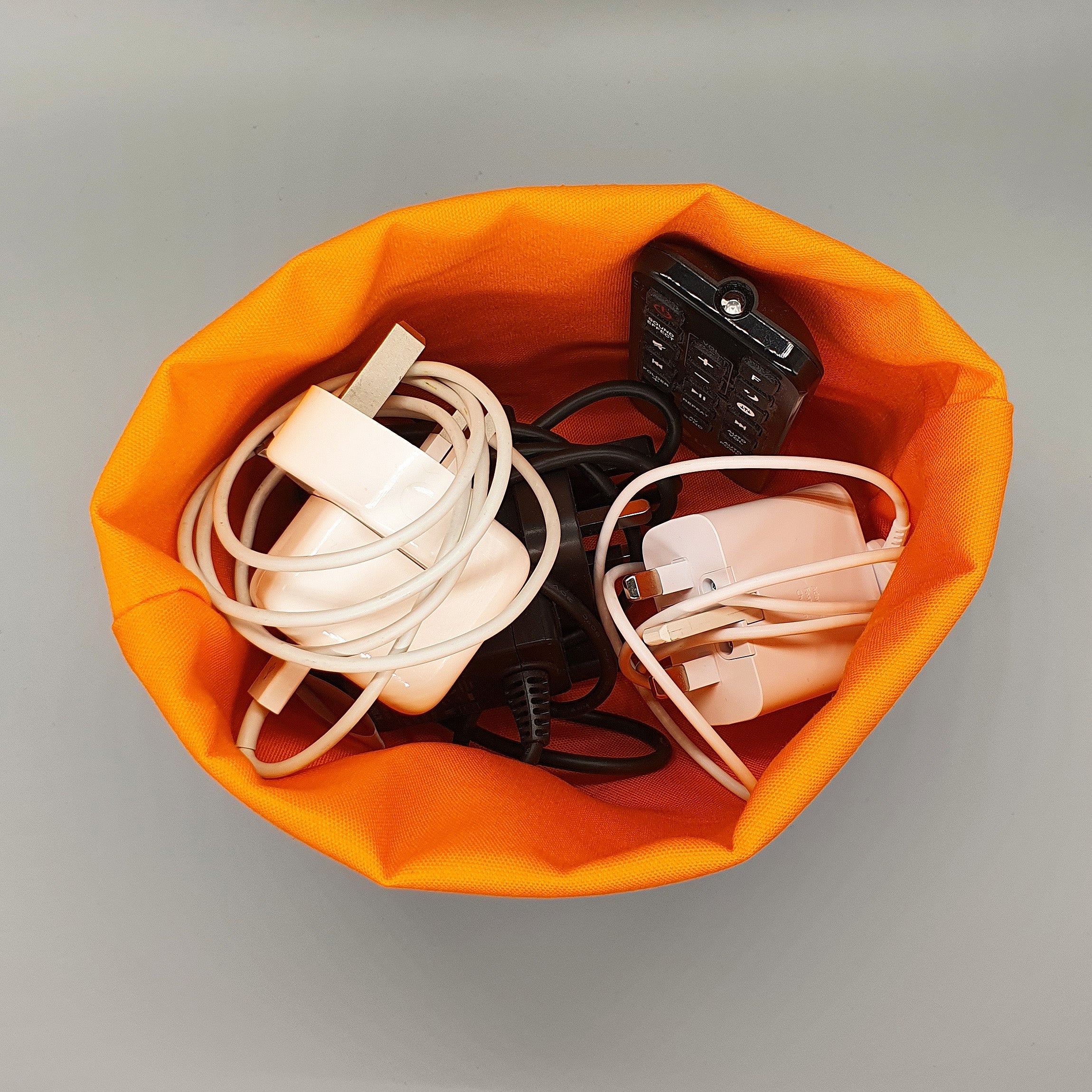 Oystercatcher storage basket with chargers & cables