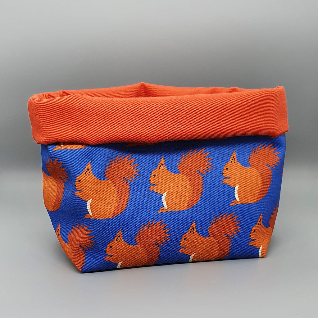 Red Squirrel fabric storage basket with orange lining