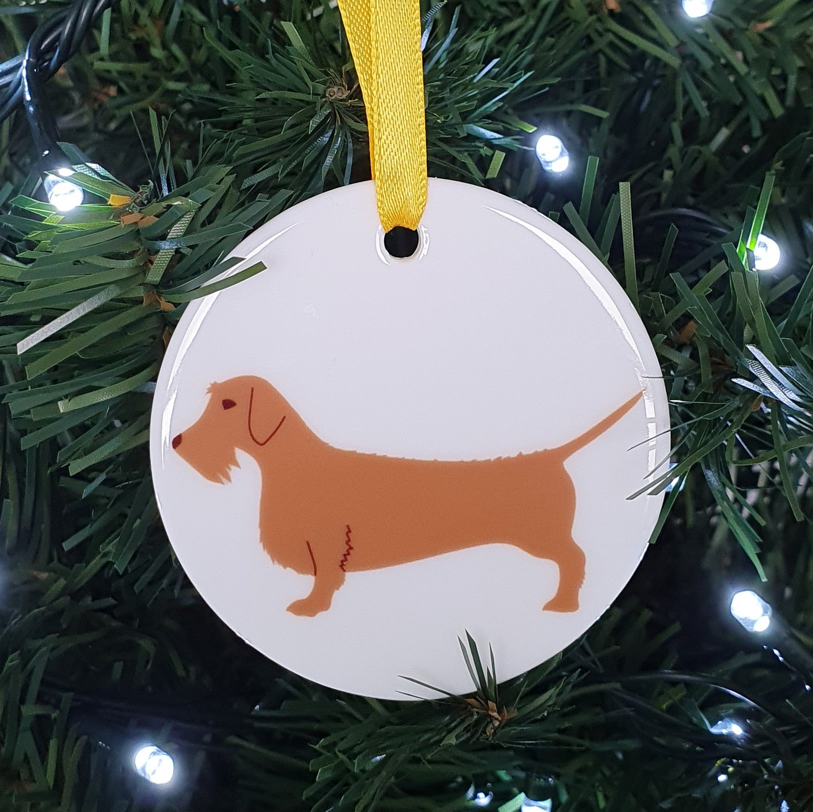 Red Wire Haired Dachshund ceramic hanging decoration in Christmas tree